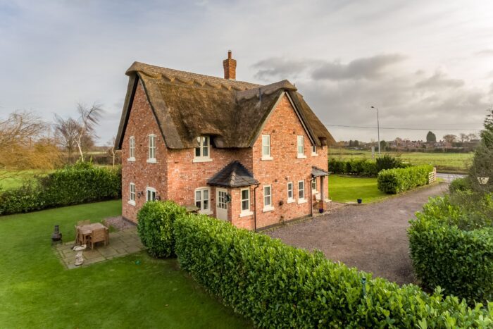 Countryside,New,Build,Detached,House,With,Thatched,Roof