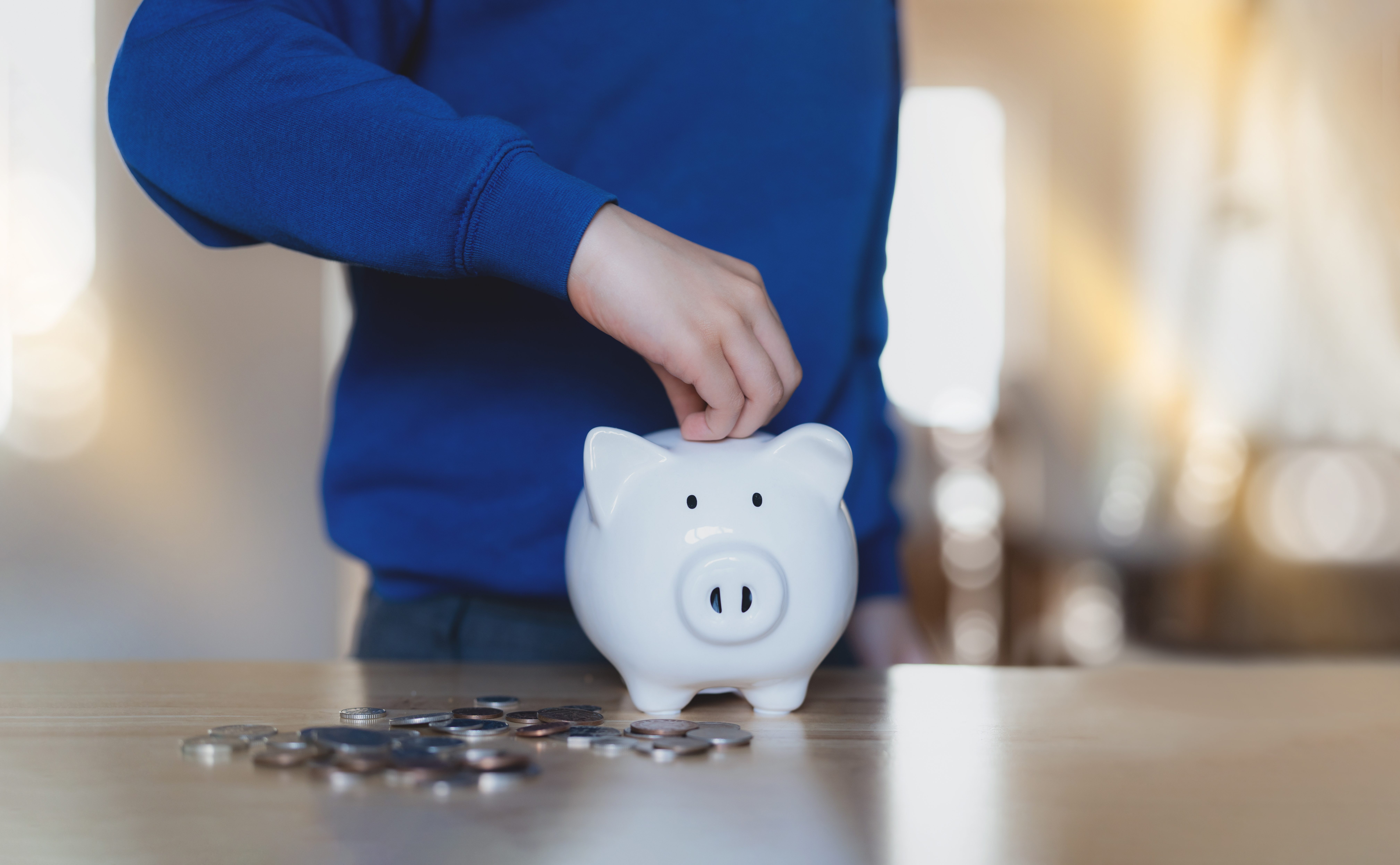 School,Kid,Putting,Coins,Into,Piggy,Bank,,Child,Boy,Counting